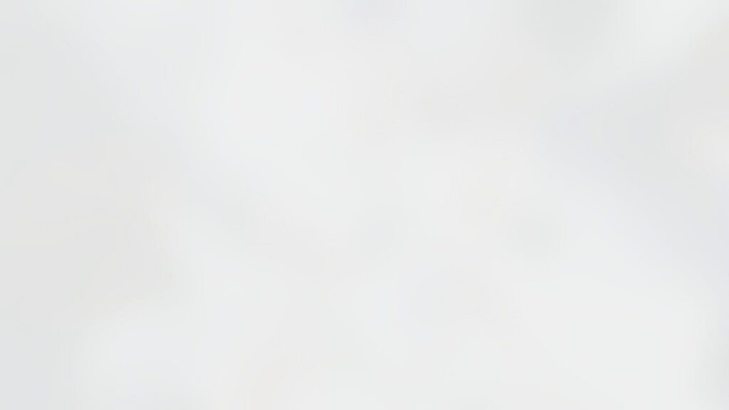 A white background with some clouds in the sky