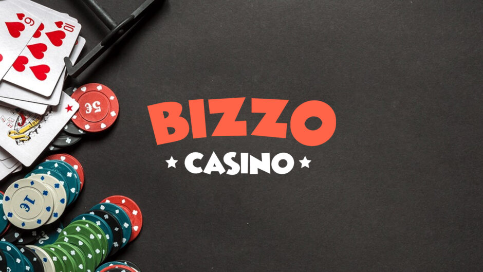 Playing cards and casino chips on table.