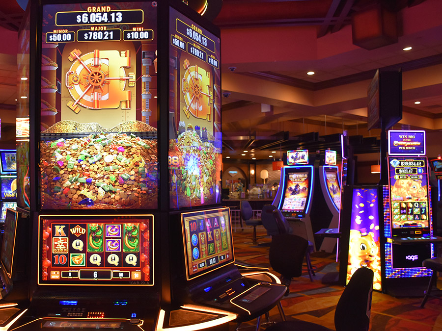 Colorful slot machines in a casino setting.