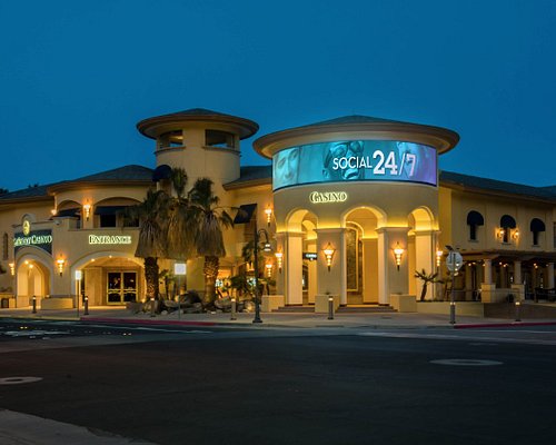 Casino building at night with neon signage.